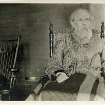 J.H. Fairbank on Porch